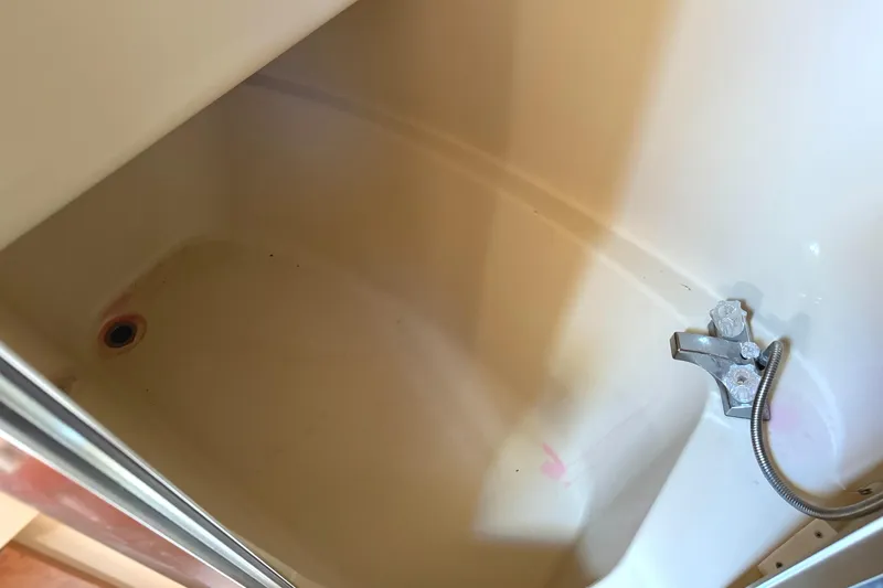 Slide: The Image of Bathtub with faucet in 2004 Meridian 381 Sedan yacht bathroom. - 46