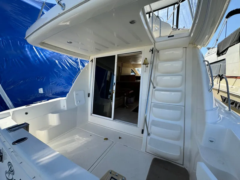 Slide: The Image of 2004 Meridian 381 Sedan yacht interior with stairs and sliding door. - 5