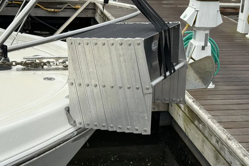 Slide: The Image of 2004 Meridian 381 Sedan with dockside metal fender protection. - 70