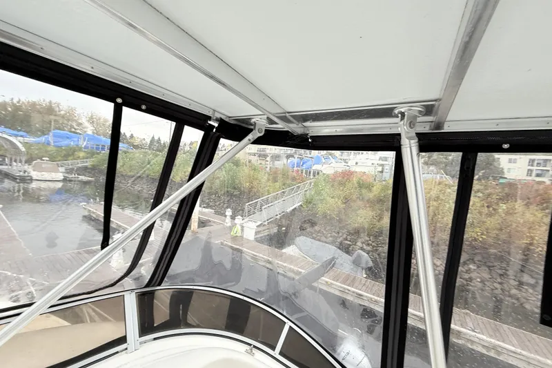 Slide: The Image of Interior view of 2004 Meridian 381 Sedan yacht docked at marina. - 79