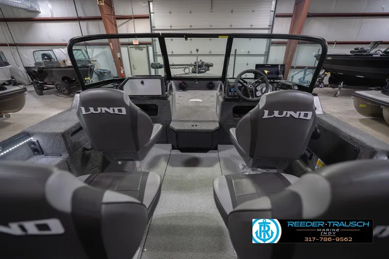 Slide: The Image of Interior of 2026 Lund 1875 Impact XS boat with seating and steering console. - 16