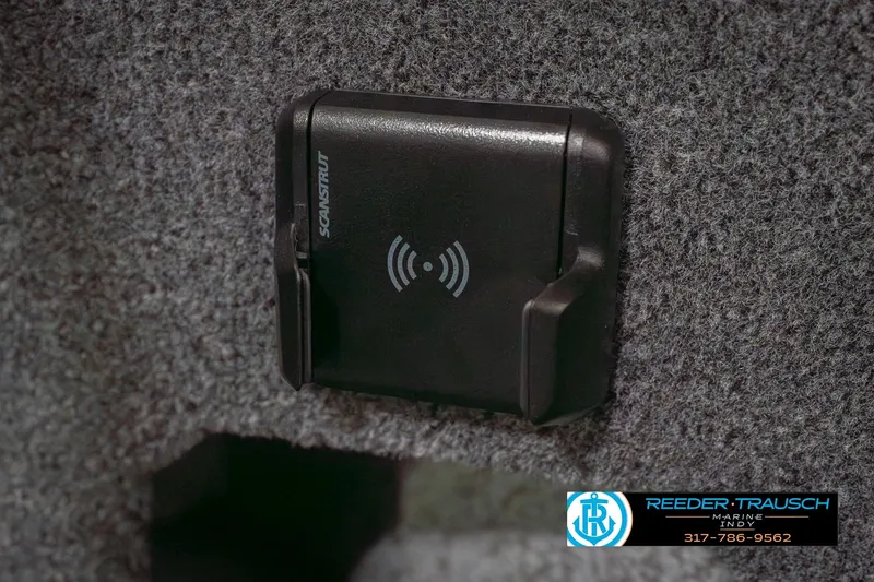 Slide: The Image of Wireless charging pad in 2026 Lund 1875 Impact XS boat interior. - 39