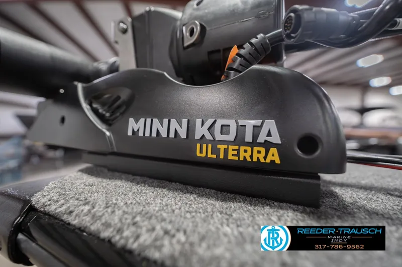 Slide: The Image of Minn Kota Ulterra motor on 2026 Lund 1875 Impact XS boat, Reeder-Trausch Marine logo visible. - 55