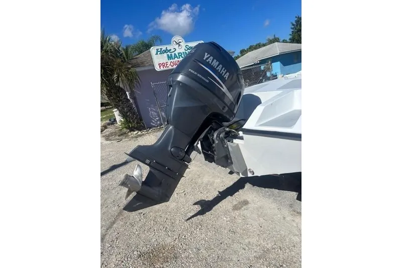 Slide: The Image of Outboard motor on a boat at Hobe Sound Marine, sunny day. - 3
