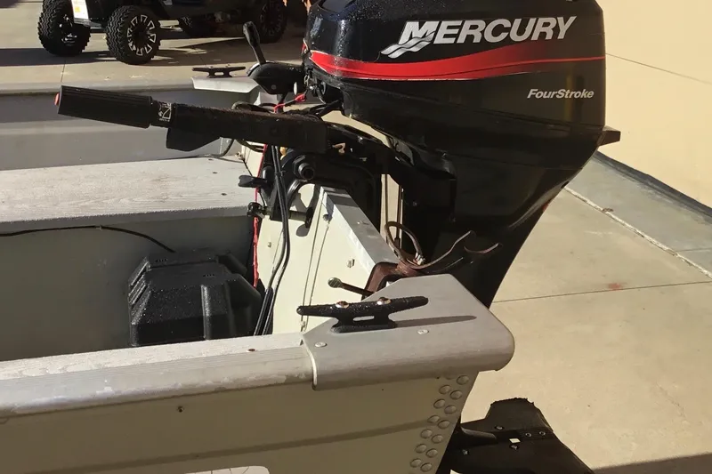 Slide: The Image of 2000 Tracker Guide V-14 Laker boat with Mercury FourStroke outboard motor. - 5