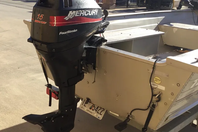 Slide: The Image of 2000 Tracker Guide V-14 Laker boat with Mercury FourStroke outboard motor. - 6