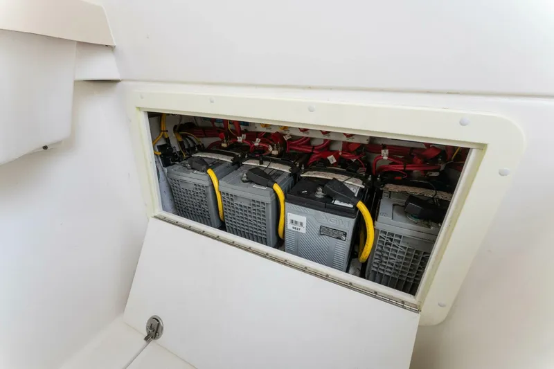 Slide: The Image of Battery compartment of 2019 Invincible 39 Open Fisherman boat, showcasing multiple batteries. - 17