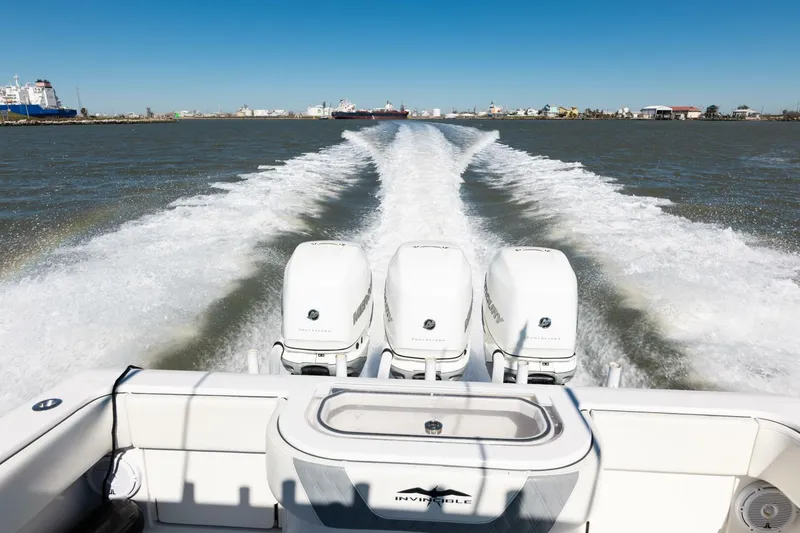 Slide: The Image of 2019 Invincible 39 Open Fisherman boat cruising with powerful engines on open water. - 29