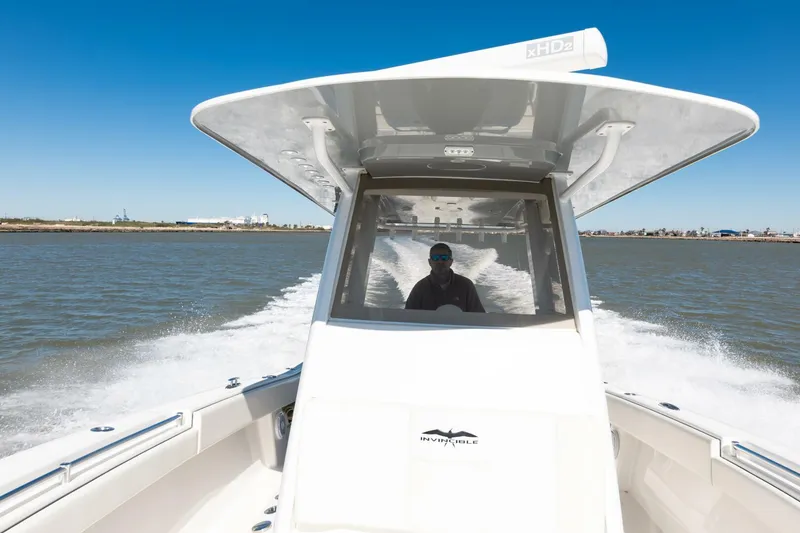 Slide: The Image of 2019 Invincible 39 Open Fisherman boat cruising on open water. - 34