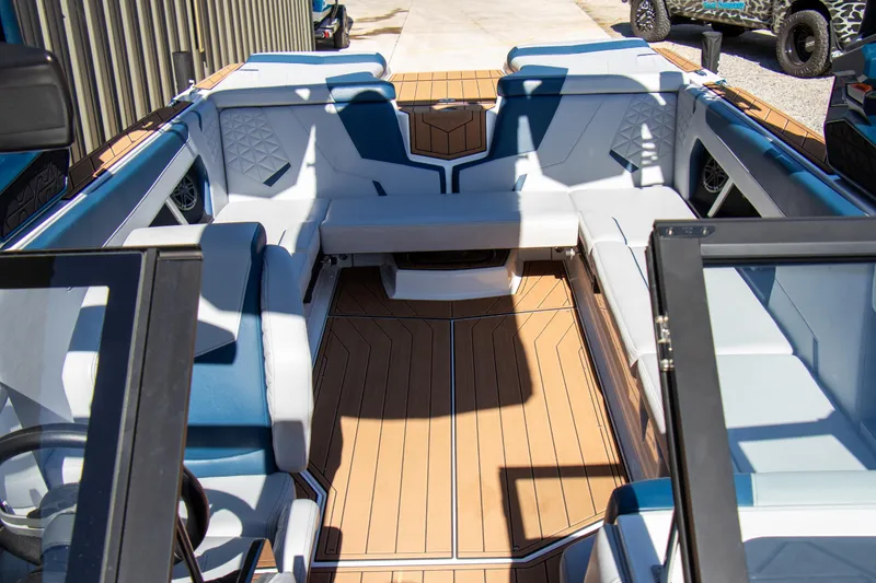 Slide: The Image of 2026 Nautique Super Air Nautique GS24 interior with luxurious seating and modern design. - 10