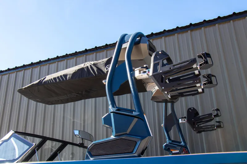 Slide: The Image of 2026 Nautique Super Air Nautique GS24 boat with wakeboard tower and racks. - 7