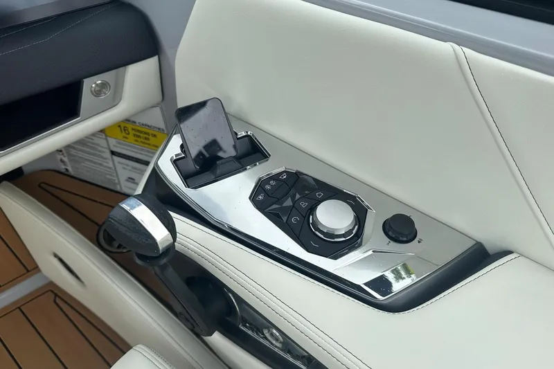 Slide: The Image of 2025 Nautique Super Air Nautique G23 control panel with sleek design and modern features. - 15