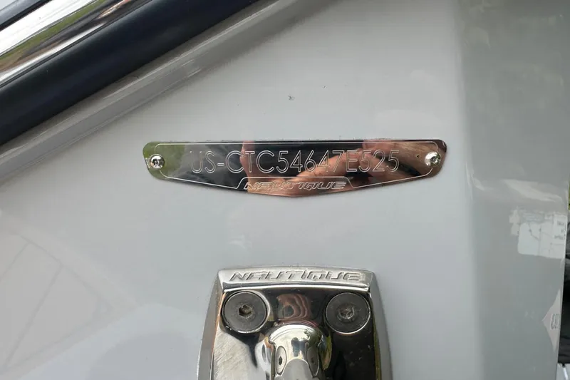 Slide: The Image of 2025 Nautique Super Air Nautique G23 hull identification number plate. - 16