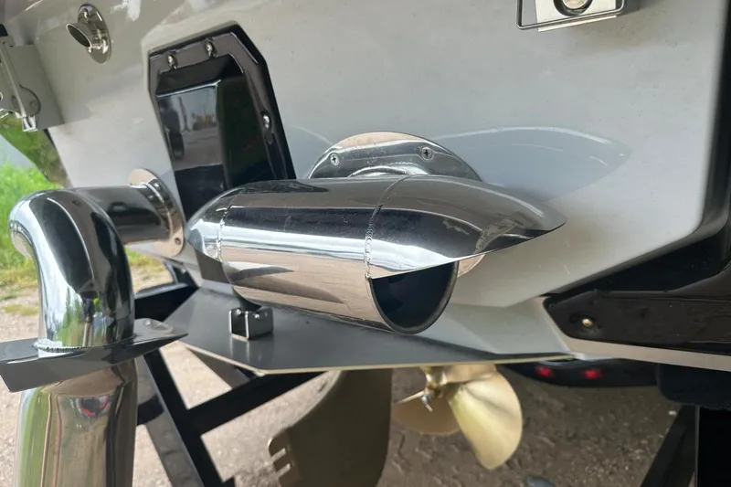 Slide: The Image of 2025 Nautique Super Air Nautique G23 boat exhaust and propeller detail. - 38