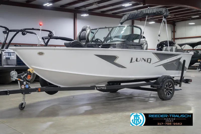 Slide: The Image of 2026 Lund 1675 Adventure Sport boat on trailer in showroom. - 3