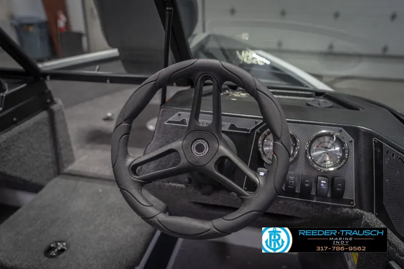 Slide: The Image of Steering wheel and dashboard of 2026 Lund 1675 Adventure Sport boat. - 35
