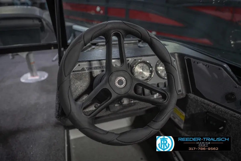 Slide: The Image of Steering wheel and dashboard of 2026 Lund 1675 Adventure Sport boat. - 36