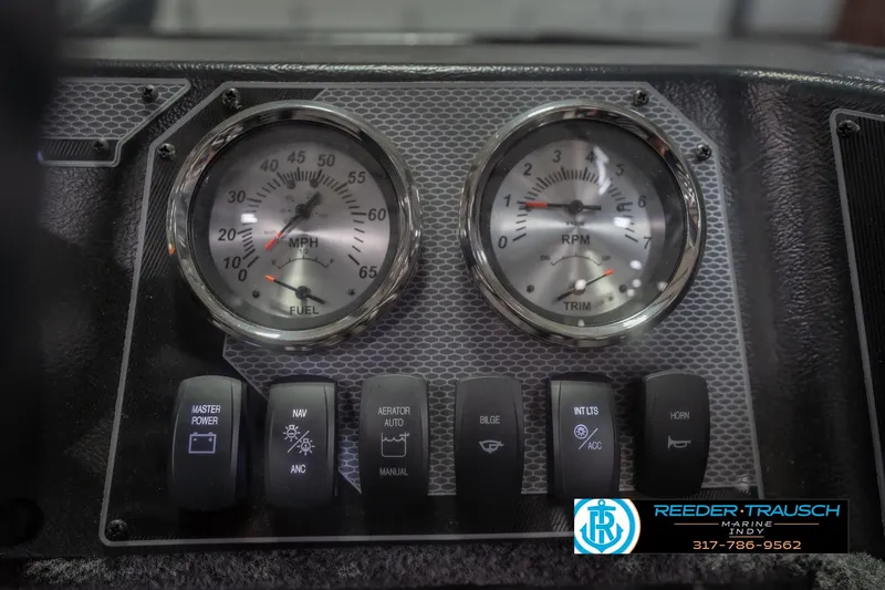 Slide: The Image of Dashboard of 2026 Lund 1675 Adventure Sport with gauges and control switches. - 38