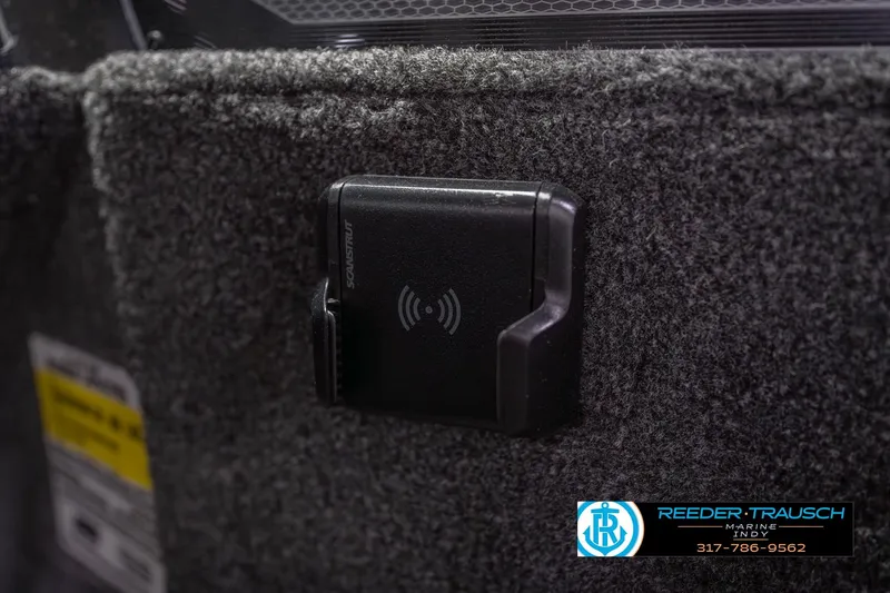 Slide: The Image of 2026 Lund 1675 Adventure Sport interior with wireless charging mount. - 39