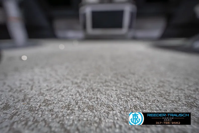 Slide: The Image of Carpeted floor of 2026 Lund 1675 Adventure Sport boat, close-up view. - 47