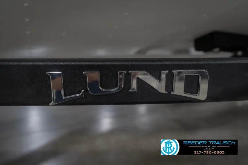 Slide: The Image of 2026 Lund 1675 Adventure Sport boat logo with Reeder Trausch Marine contact details. - 57