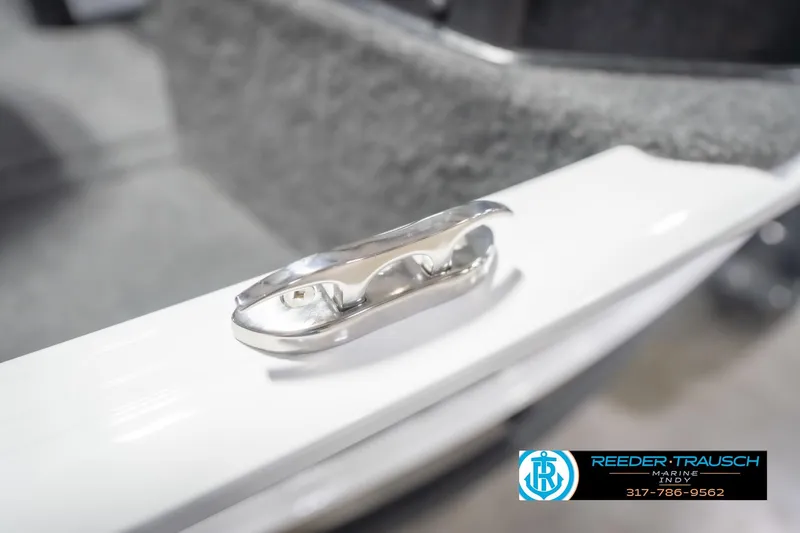Slide: The Image of 2026 Lund 1675 Adventure Sport boat cleat detail, Reeder Trausch Marine logo visible. - 67