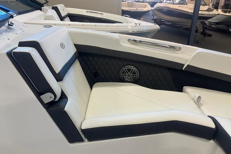Slide: The Image of Luxurious interior of 2026 Cobalt R6 boat with white and black seating. - 20