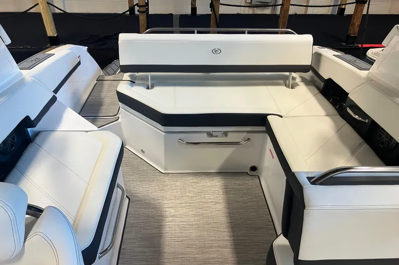 Slide: The Image of 2026 Cobalt R6 boat interior with white seating and modern design. - 6