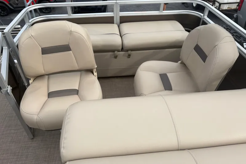 Slide: The Image of 2024 Sun Tracker SportFish 22 DLX interior with beige seating and modern design. - 13