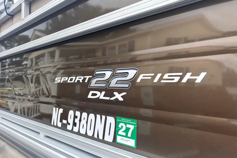 Slide: The Image of 2024 Sun Tracker SportFish 22 DLX boat with registration number NC-9380ND. - 6