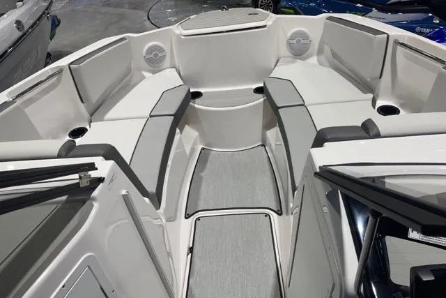 Slide: The Image of 2025 Yamaha Boats SX220 interior with spacious seating and modern design. - 4