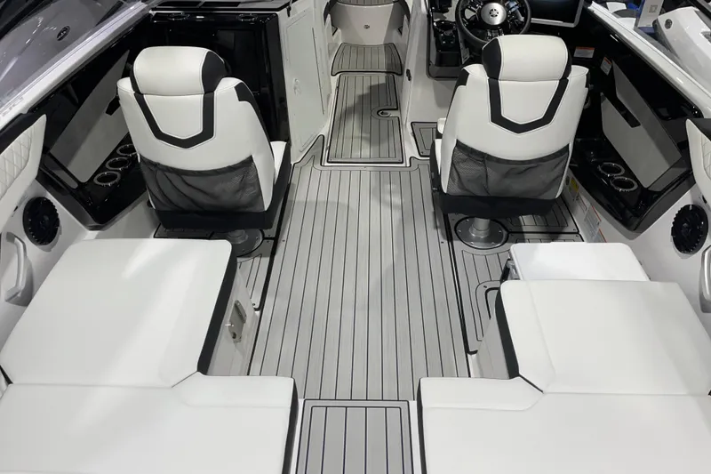 Slide: The Image of 2025 Yamaha Boats 222SD interior with sleek seating and modern design. - 2
