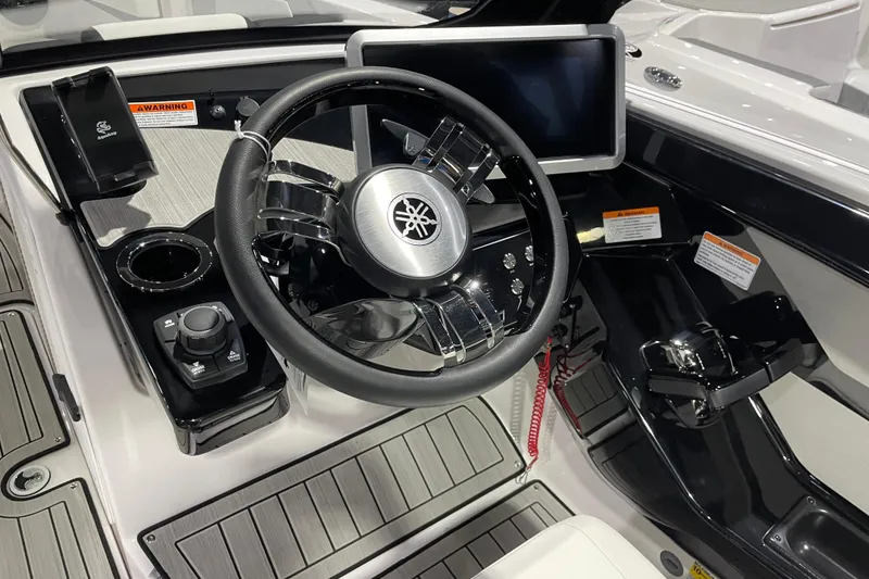 Slide: The Image of 2025 Yamaha Boats 222SD steering console with modern controls and touchscreen display. - 3