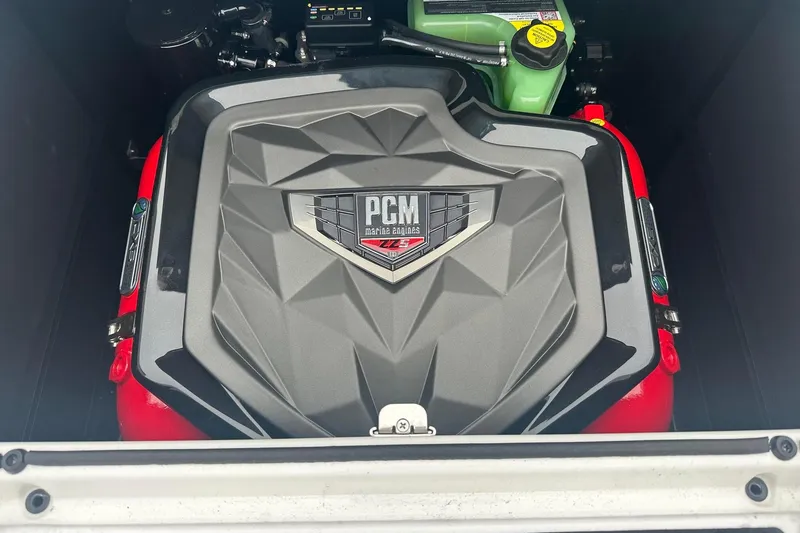Slide: The Image of 2025 Nautique Super Air Nautique GS22 engine compartment with PCM marine engine. - 14