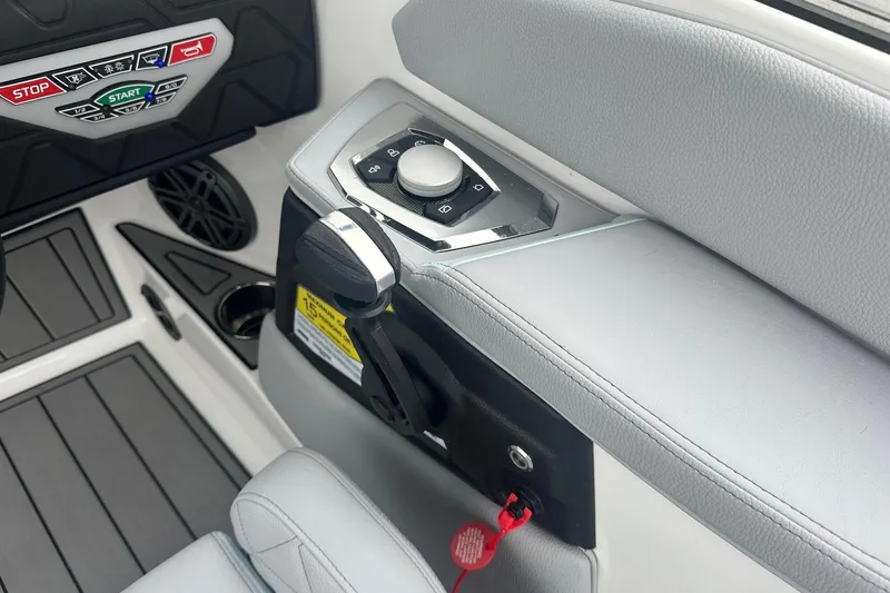 Slide: The Image of 2025 Nautique Super Air Nautique GS22 boat control panel with sleek design and modern features. - 16