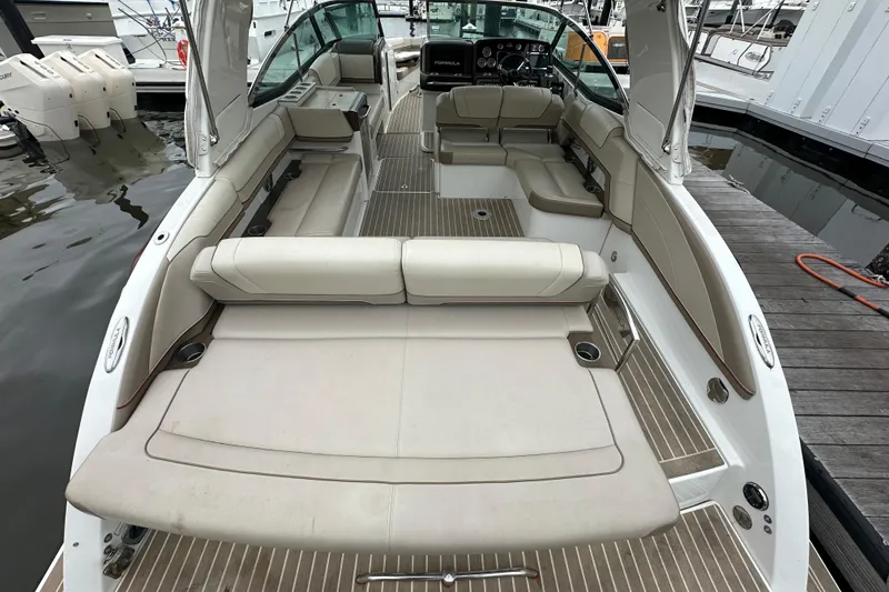 Slide: The Image of 2016 Formula 330 Crossover Bowrider interior with spacious seating and modern design. - 6