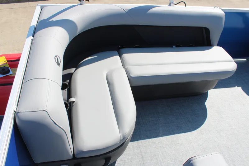 Slide: The Image of 2026 Sun Tracker Party Barge 16 DLX, featuring sleek gray seating and modern design. - 12