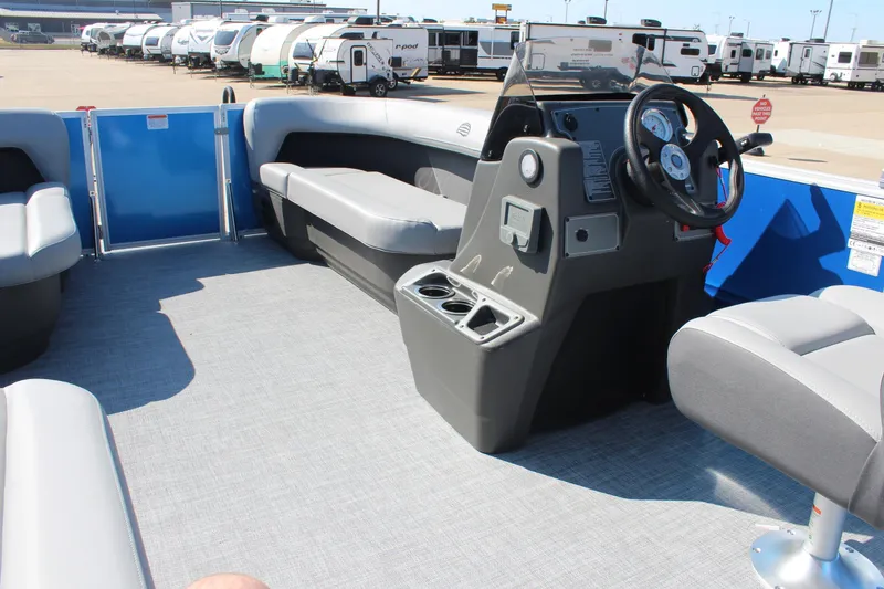 Slide: The Image of Interior of 2026 Sun Tracker Party Barge 16 DLX pontoon boat with seating and steering console. - 22