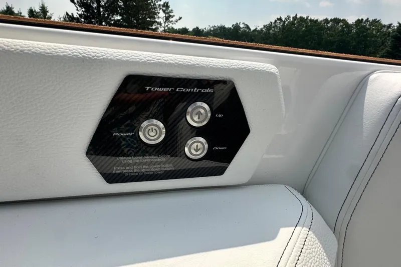 Slide: The Image of Control panel of 2026 Nautique Super Air Nautique GS22E boat with tower controls. - 19