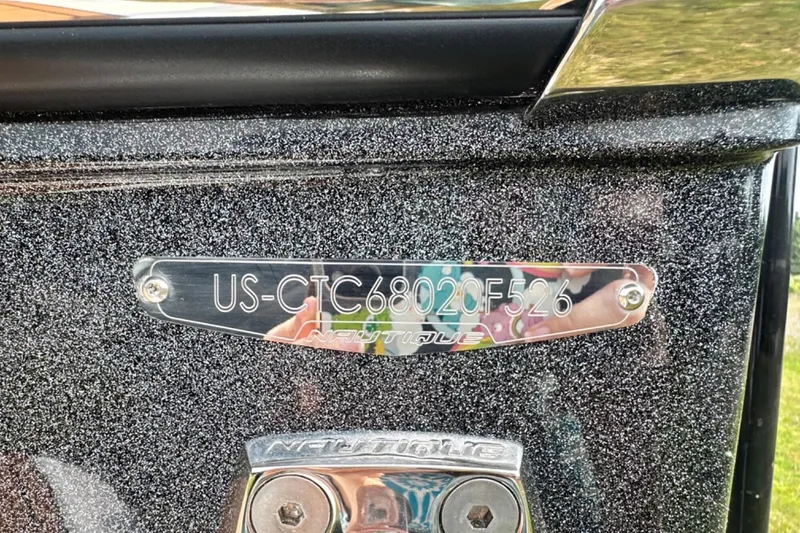 Slide: The Image of 2026 Nautique Super Air Nautique GS22E boat identification plate with metallic finish. - 28