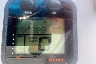 Slide: The Image of Close-up of a digital tachometer on a 2014 Sea Hunt Gamefish 25 boat. - 12