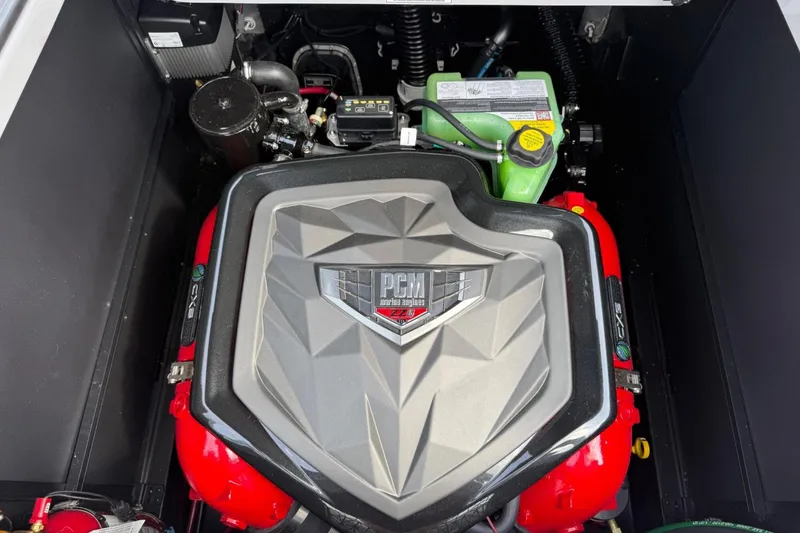 Slide: The Image of Engine of 2026 Nautique Super Air Nautique G25, featuring PCM branding and components. - 13