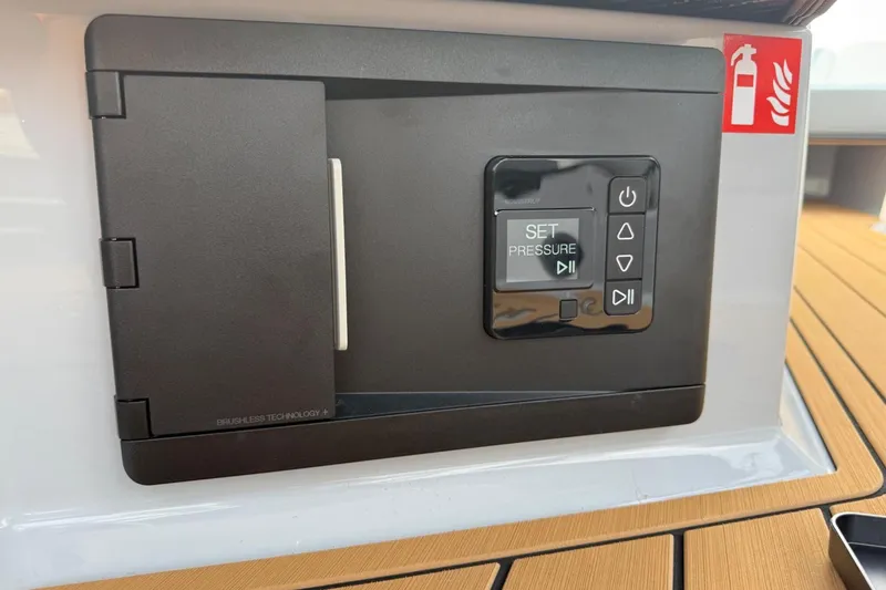 Slide: The Image of Control panel on 2026 Nautique Super Air Nautique G25 boat with pressure settings. - 18