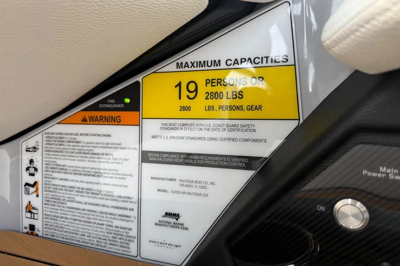 Slide: The Image of Capacity label on 2026 Nautique Super Air Nautique G25, max 19 people or 2800 lbs. - 20