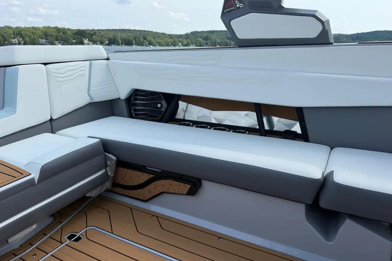 Slide: The Image of 2026 Nautique Super Air Nautique G25 interior with sleek seating and modern design. - 5