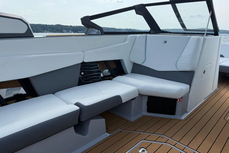 Slide: The Image of 2026 Nautique Super Air Nautique G25 interior with sleek seating and modern design. - 6