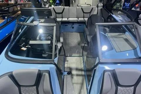 Slide: The Image of 2025 Yamaha Boats 255XD interior, showcasing sleek seating and modern design. - 2