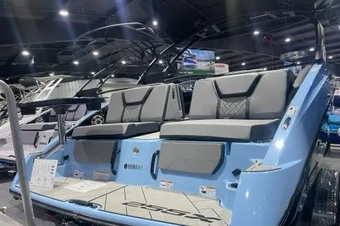 Slide: The Image of 2025 Yamaha Boats 255XD, sleek design, luxury seating, showcased in a well-lit indoor setting. - 3