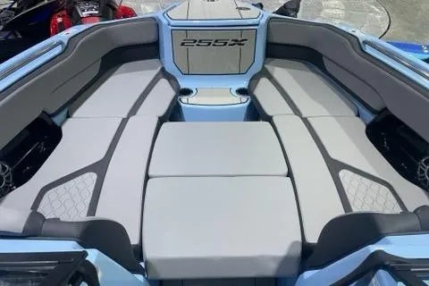 Slide: The Image of 2025 Yamaha Boats 255XD interior with gray seating and modern design. - 4