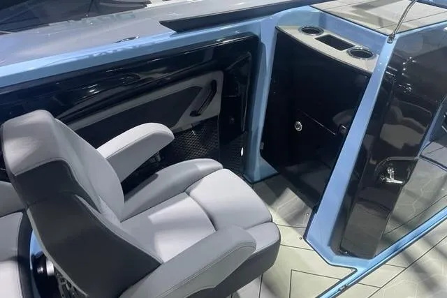 Slide: The Image of 2025 Yamaha Boats 255XD interior with modern seating and sleek design. - 7
